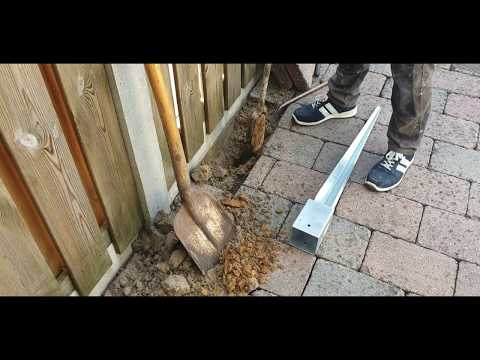 Hoe zet je een paal stevig in grond